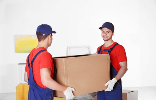 Removal team loading household items for a home move in Hire