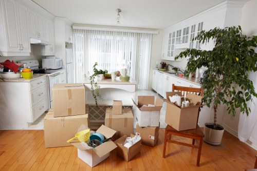 Local movers handling desks and office items in Hire